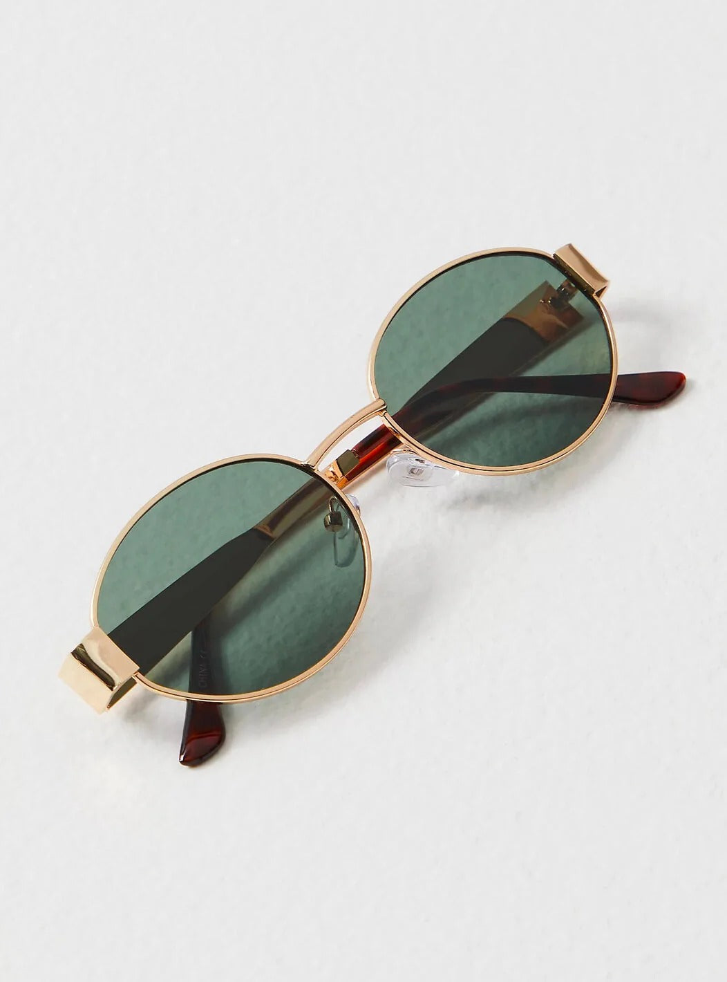 Oval Gold Frame Sunglasses with Green Lenses