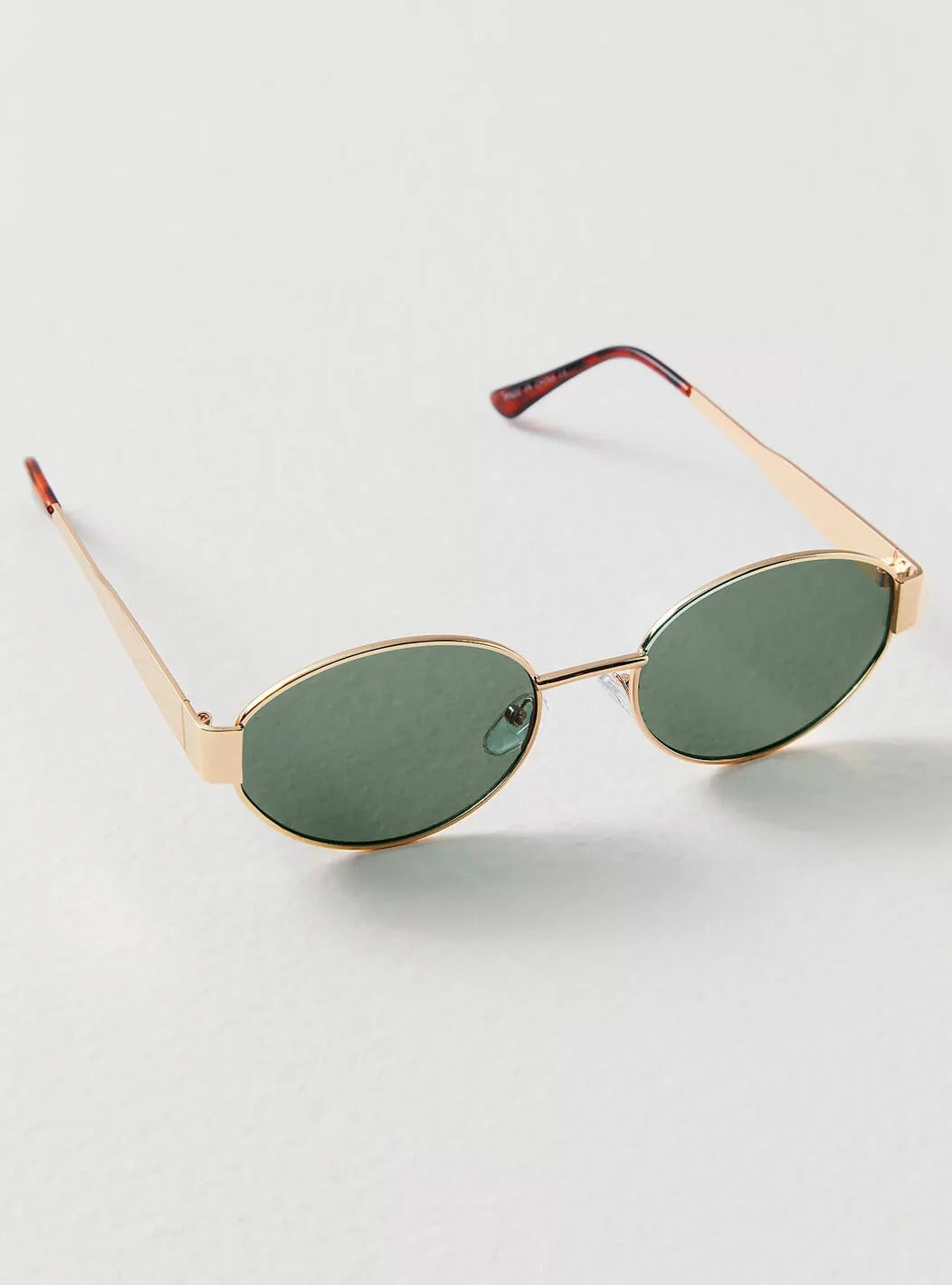 Oval Gold Frame Sunglasses with Green Lenses